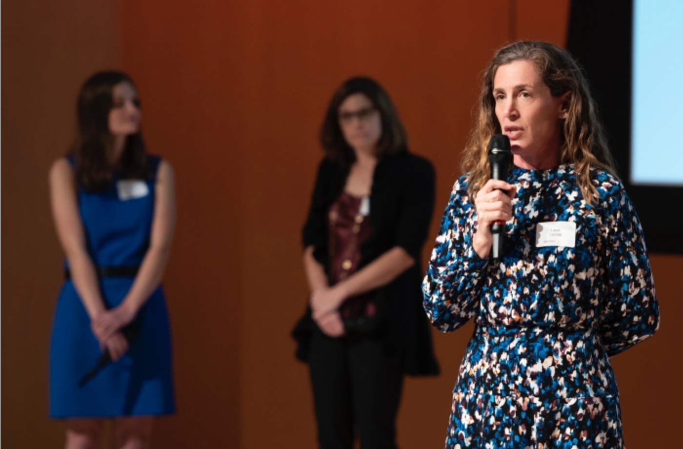 Leah Gerber presenting biodiversity research to a general audience.Â Gerber studies how to help policymakers make more efficient conservation decisions. Photo courtesy of the Center for Biodiversity Outcomes