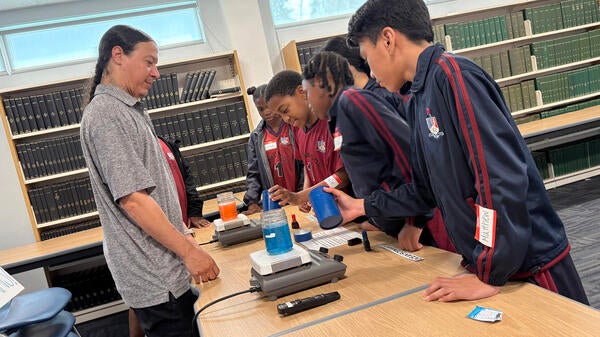 students do an ocean temperature experiment